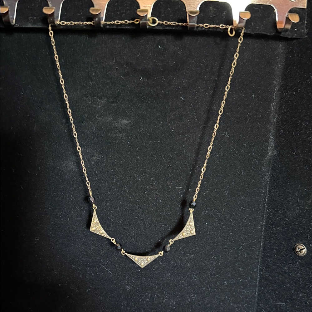 Gold Triangle Accent Necklace with Black Bead Details